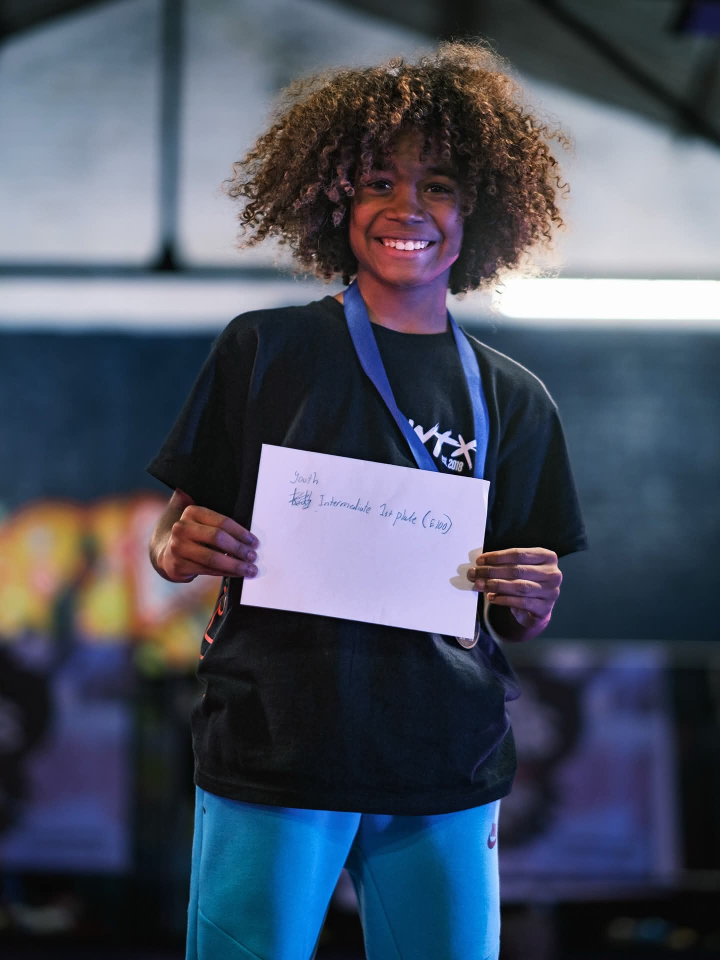 Junior WightTricks athlete after a first-place finish