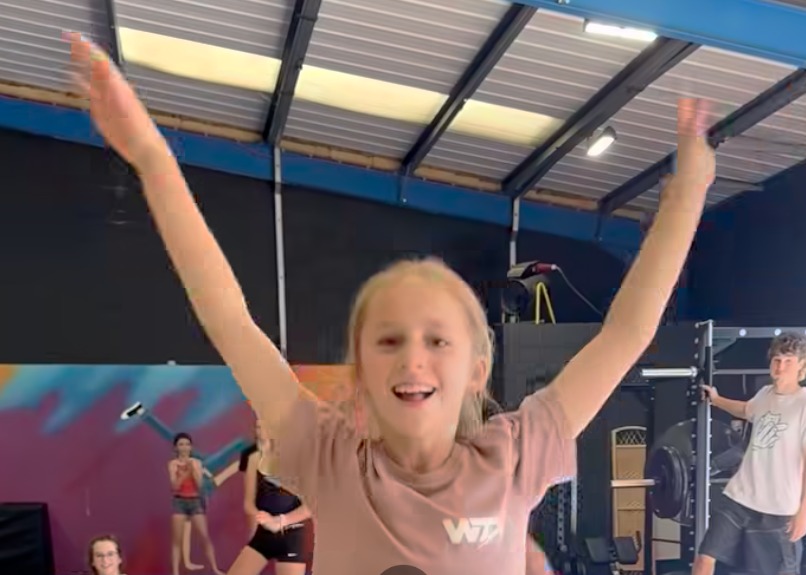 Young WightTricks athlete celebrating landing a new skill