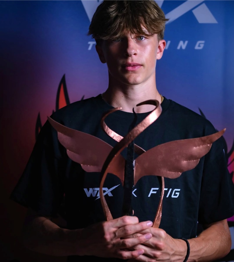 WightTricks athlete holding the Flip The Island 2026 trophy