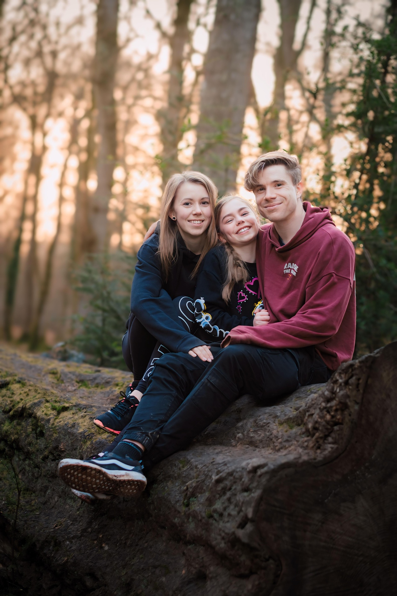 Robbie Bates with his family in woodland on the Isle of Wight